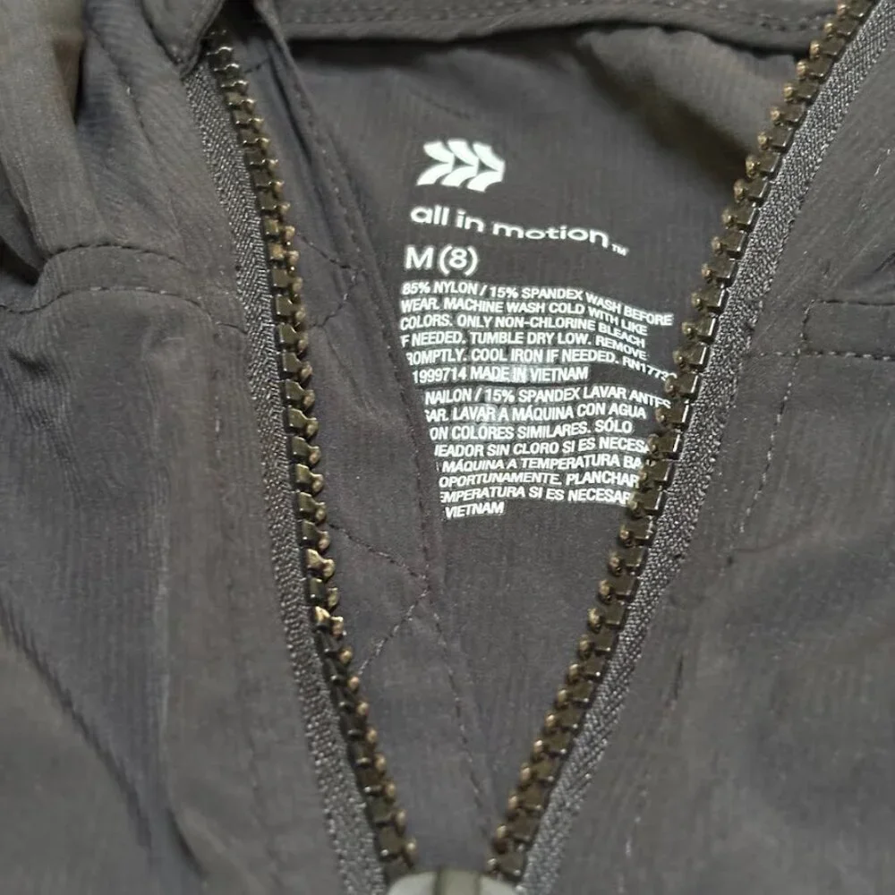 All in Motion Black, hooded, zip-up windbreaker jacket Youth